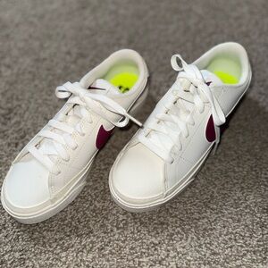 Nike White Low-Top Sneakers with Burgundy Swoosh